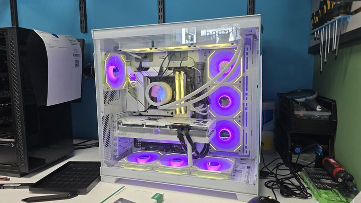 White desktop PC with multicolor lighting and liquid cooling